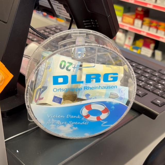 Ein Lottoladen in Rumeln Kaldenhausen hat eine Spendendose für die DLRG aufgestellt
